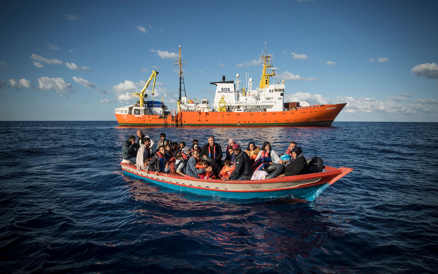 A wooden boat carrying 29 people, mainly Syrians, just before their rescue and transfer to the Aquarius. October 10, 2017.