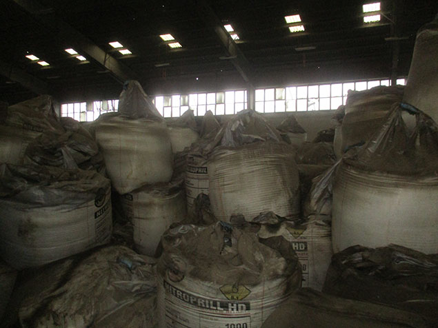 Piled bags inside the warehouse