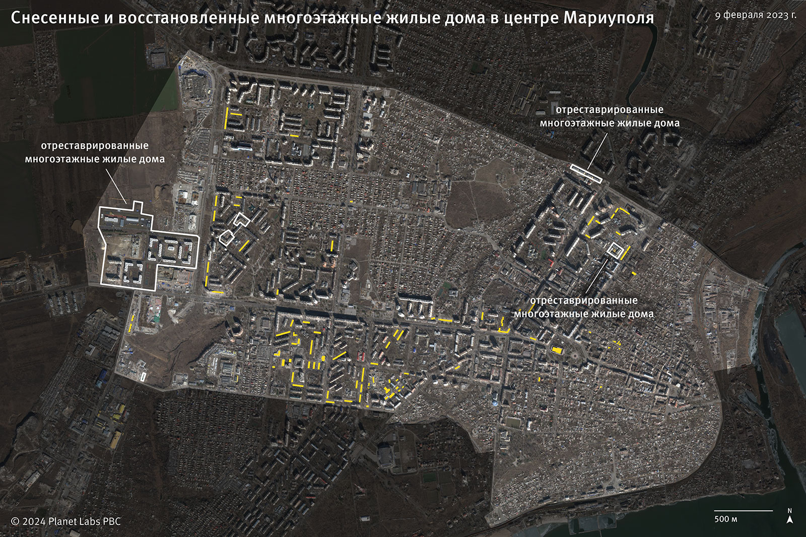Demolished high-rise apartment buildings in Central Mariupol