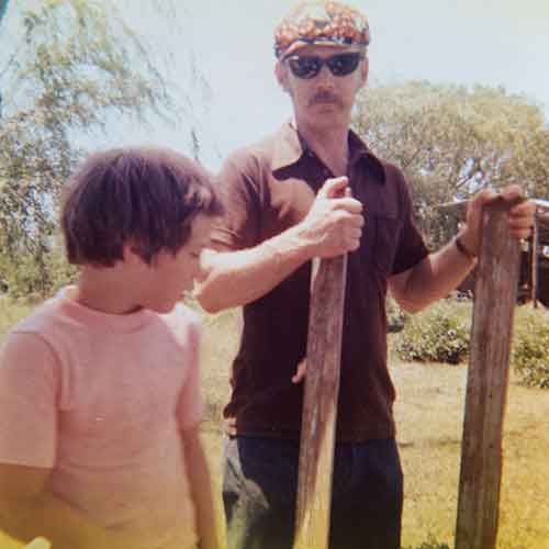  Allen, age 36, with his son, age 10, at his parents’ house in Americus, Kansas, on July 4, 1975. 